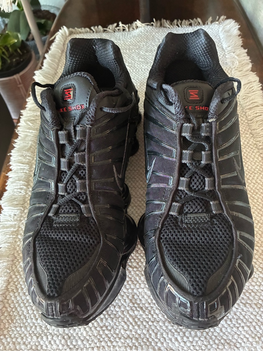 Nike women’s Black Athletic Running Shoes with Red Accents